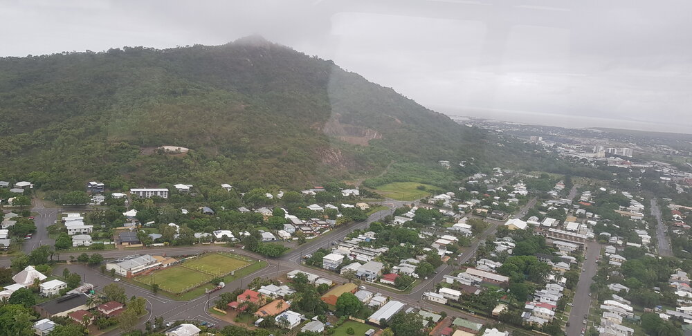 Cutheringa Bowls Club, West End, looking towards Castle Hill, aerial photograph during floods, 2019. 
