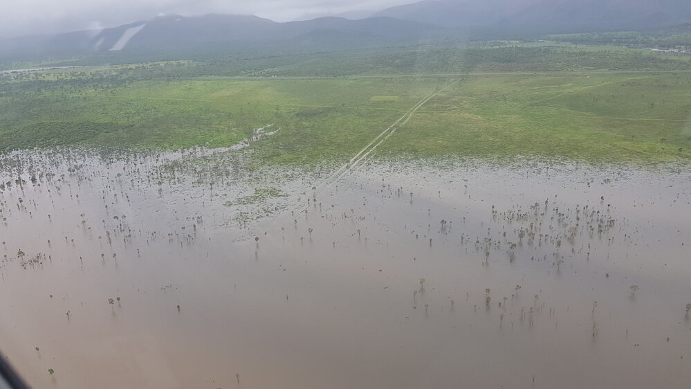 Flood waters cover rural lands, Townsville,  aerial photograph during floods, 2019.