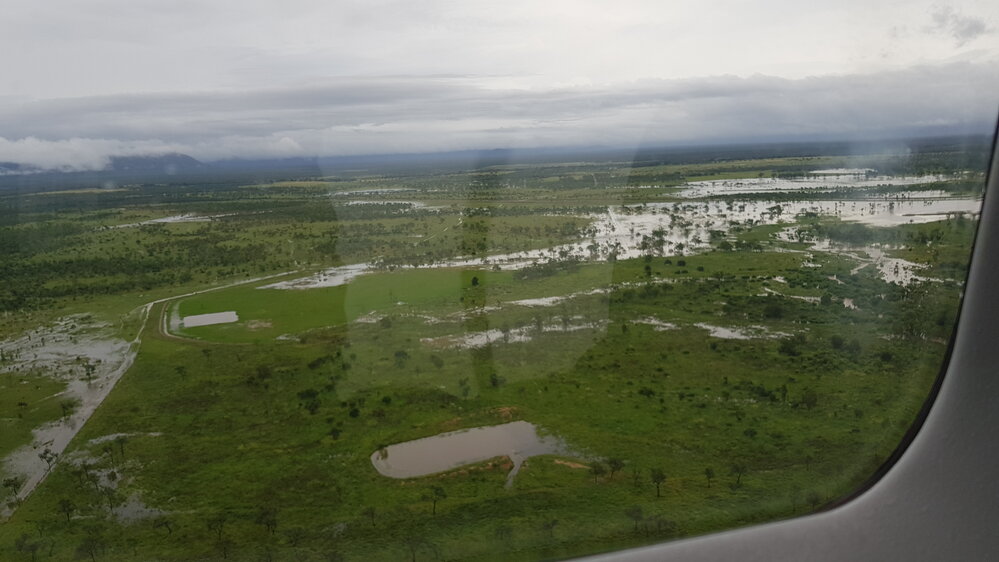 Flood waters cover rural lands, Townsville,  aerial photograph during floods, 2019.