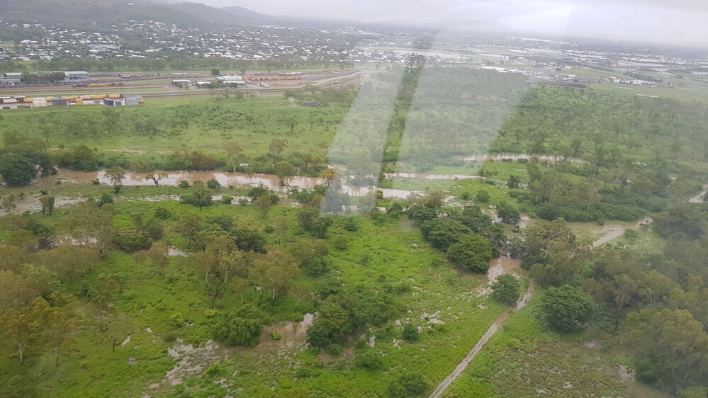 Stuart Creek in flood, aerial photograph, 2019. 