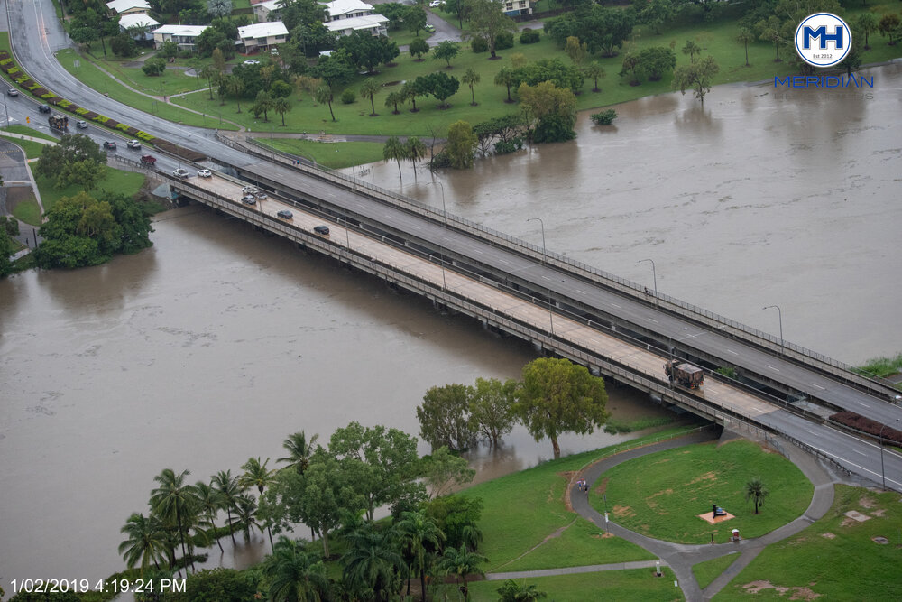 Ross River, Charles N Barton Bridge, Cranbrook, aerial photograph during floods, 2019. 