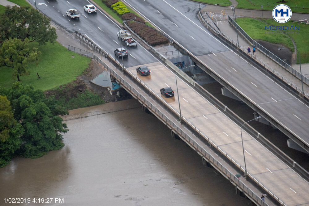 Ross River, Charles N Barton Bridge, Cranbrook, aerial photograph during floods, 2019. 