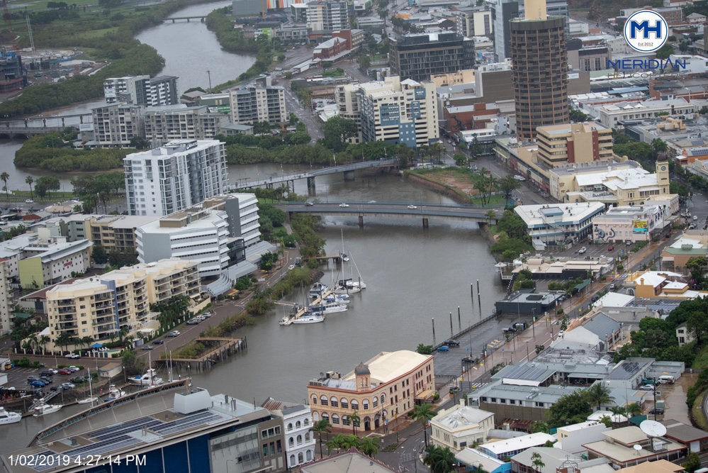 Ross Creek, George Roberts Bridge, Victoria Bridge, "Ice Works" Wharf, aerial photograph during floods, 2019. 