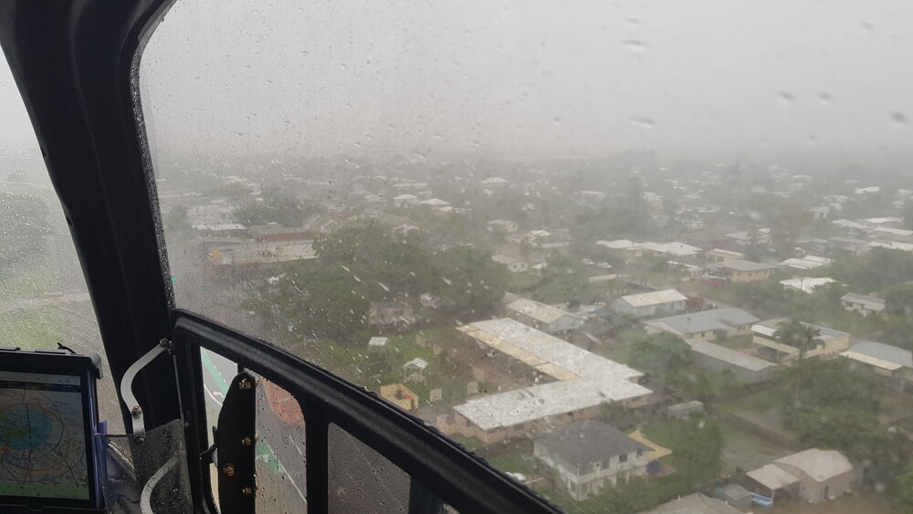Oonoonba - Abbott Street, aerial photograph during floods, 2019. 