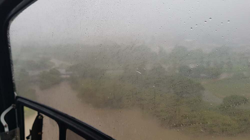 Boundary Street Bridge over Ross Creek, aerial photograph during floods, 2019. 