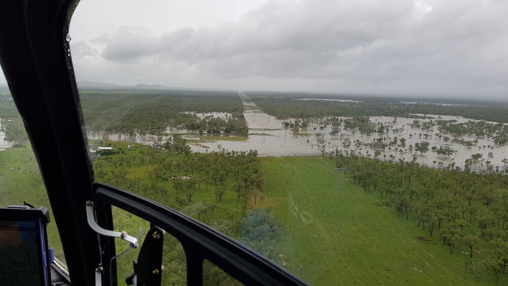 Woodstock Giru Road Powerline Track (19&deg;36'08.8"S 146&deg;53'12.2"E), aerial photograph during floods, 2019