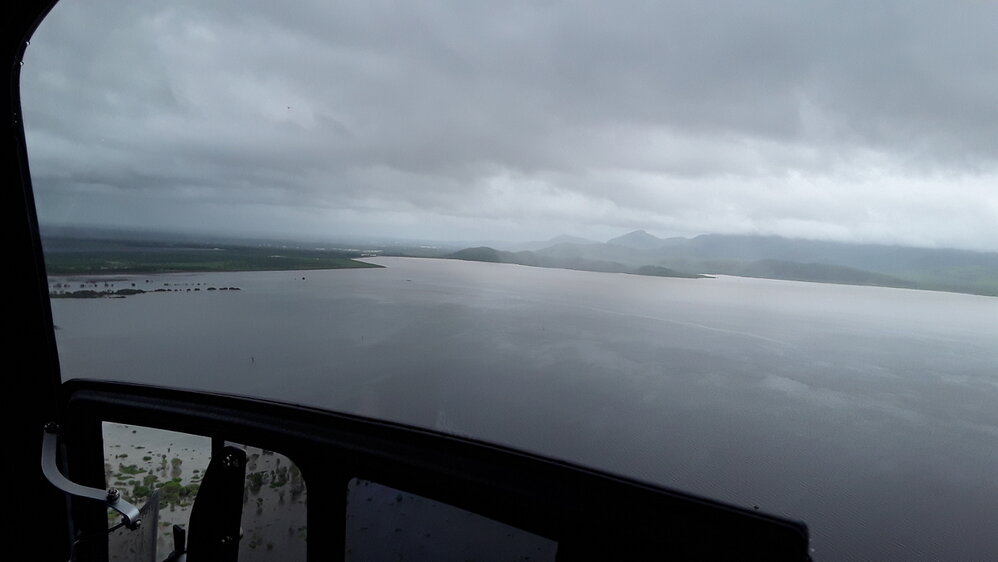 Flinders Highway Woodstock facing back to Ross River Dam, aerial photograph during floods, 2019. 
