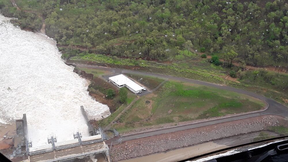 Ross River Dam Spill Way, aerial photograph during floods, 2019. 