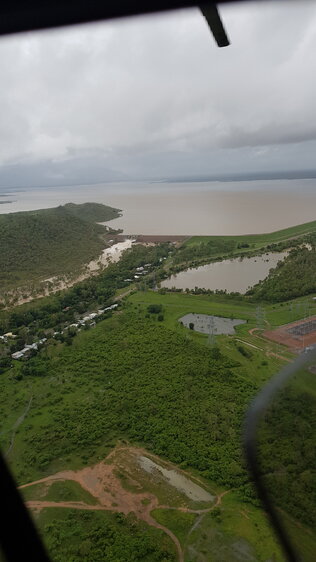 Ross River Dam Spill Way, aerial photograph during floods, 2019. 