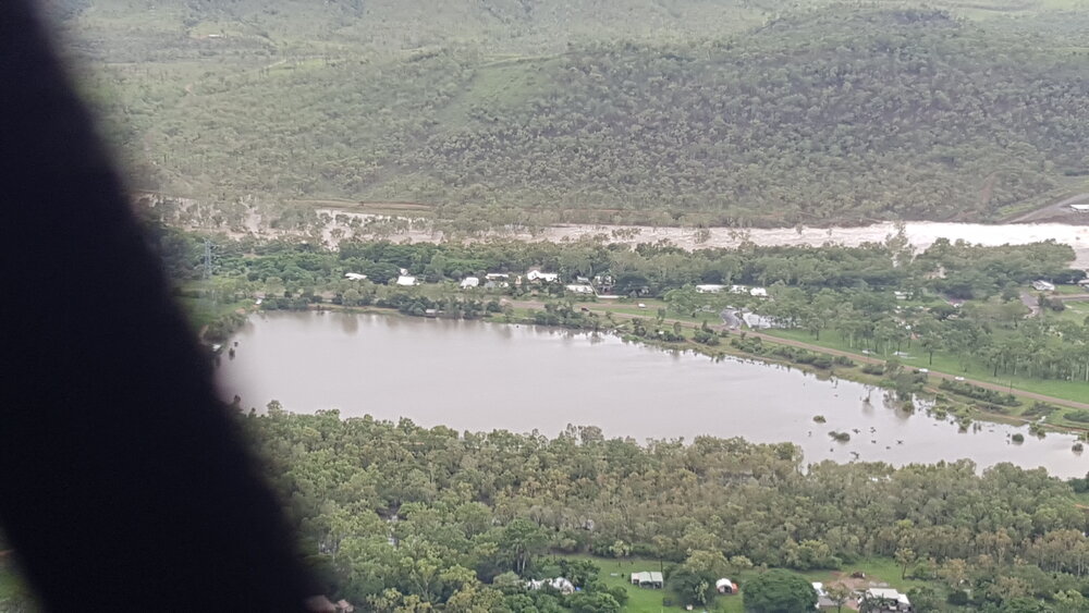 Ross River Dam Spill Way, aerial photograph during floods, 2019. 