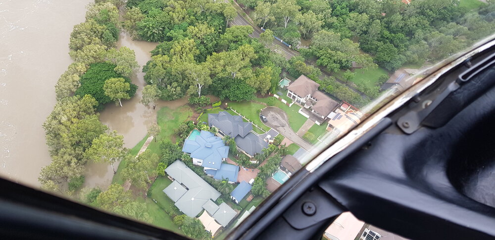 Riverside Gardens Community Centre, Riverside Boulevard, Charles N Barton Bridge, aerial photograph during floods, 2019. 