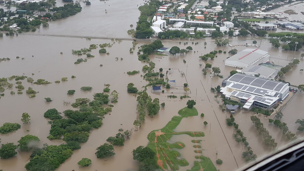 Bowen Road Bridge, Townsville Basketball Stadium, aerial photograph during floods, 2019.