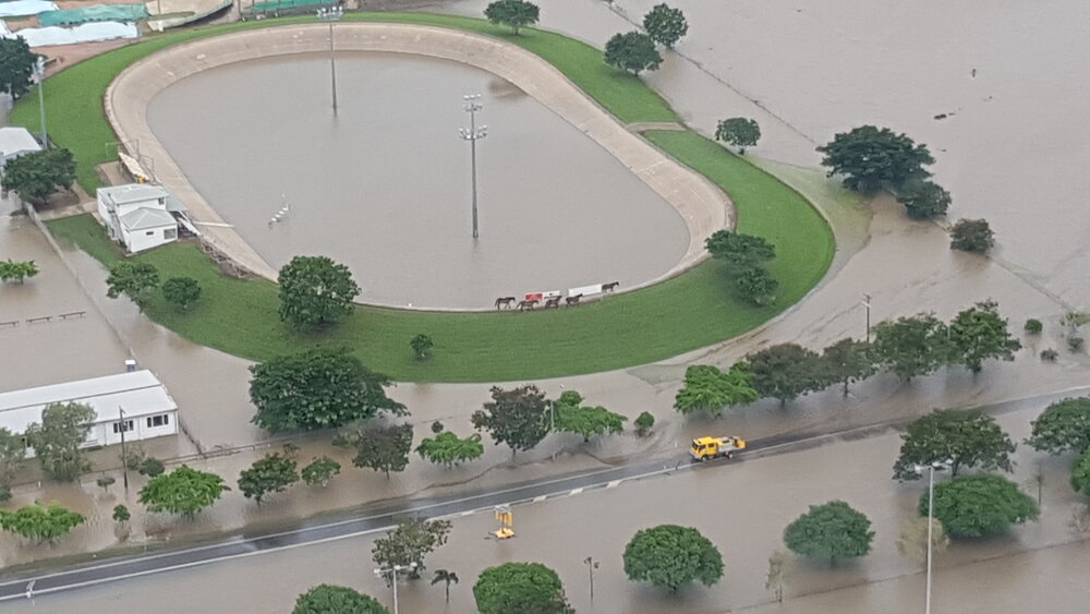 Stuart Drive, Townsville Velodrome, Gordon Creek, aerial photograph during floods, 2019. 
