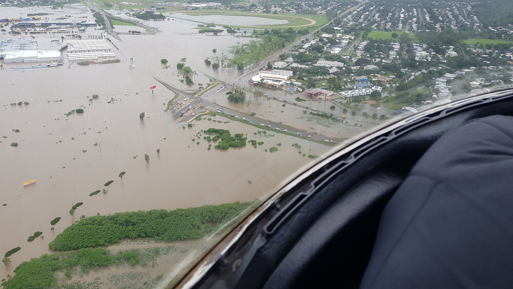 Stuart Drive Intersection, Kmart Fairfield, Townsville Turf Club, aerial photograph during floods, 2019. 