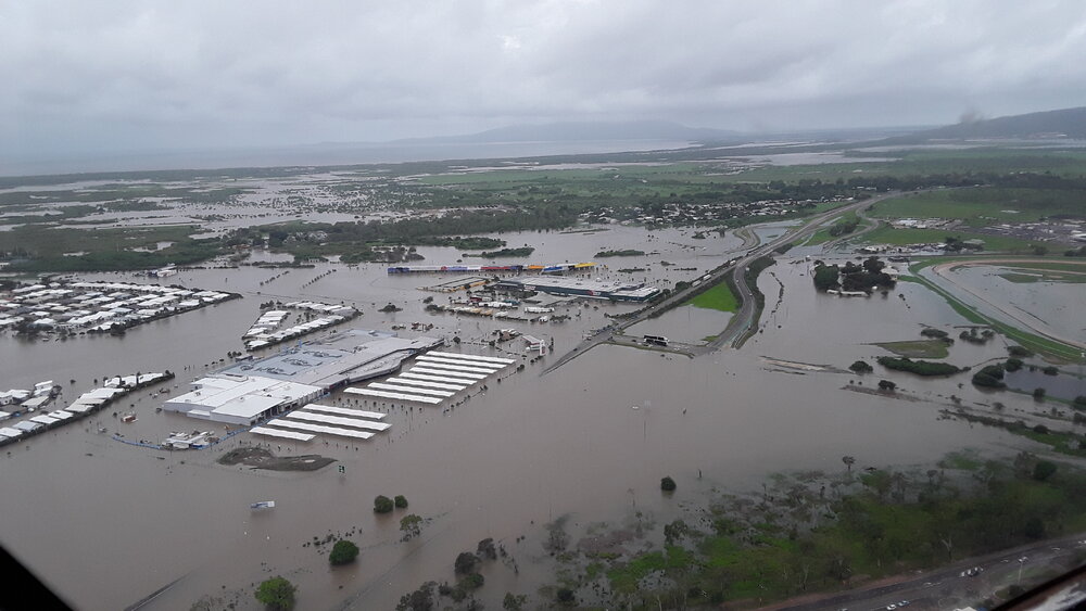 Stuart Drive Intersection, Kmart Fairfield, Townsville Turf Club, aerial photograph during floods, 2019. 