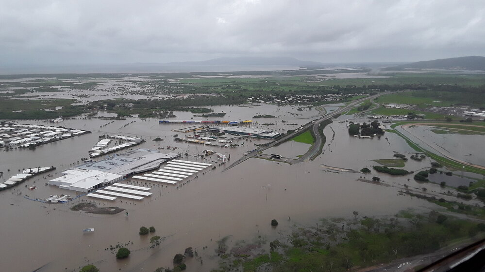 Stuart Drive Intersection, Kmart Fairfield, Townsville Turf Club, aerial photograph during floods, 2019. 