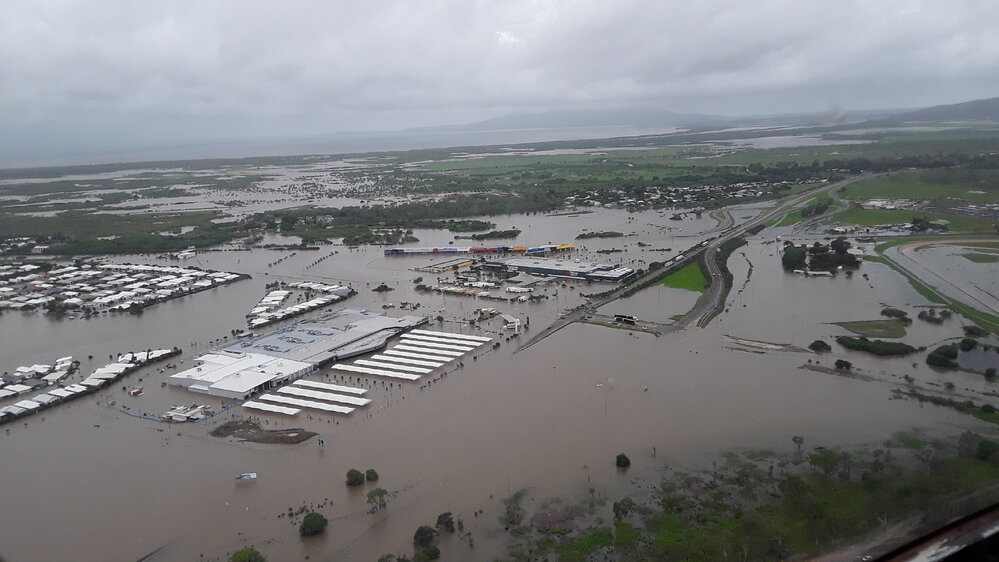 Stuart Drive Intersection, Kmart Fairfield, Townsville Turf Club, aerial photograph during floods, 2019. 