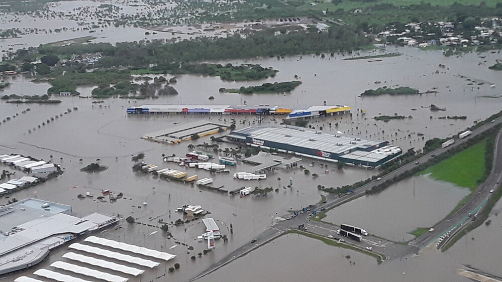 Stuart Drive Intersection, Kmart Fairfield, Townsville Turf Club, aerial photograph during floods, 2019. 
