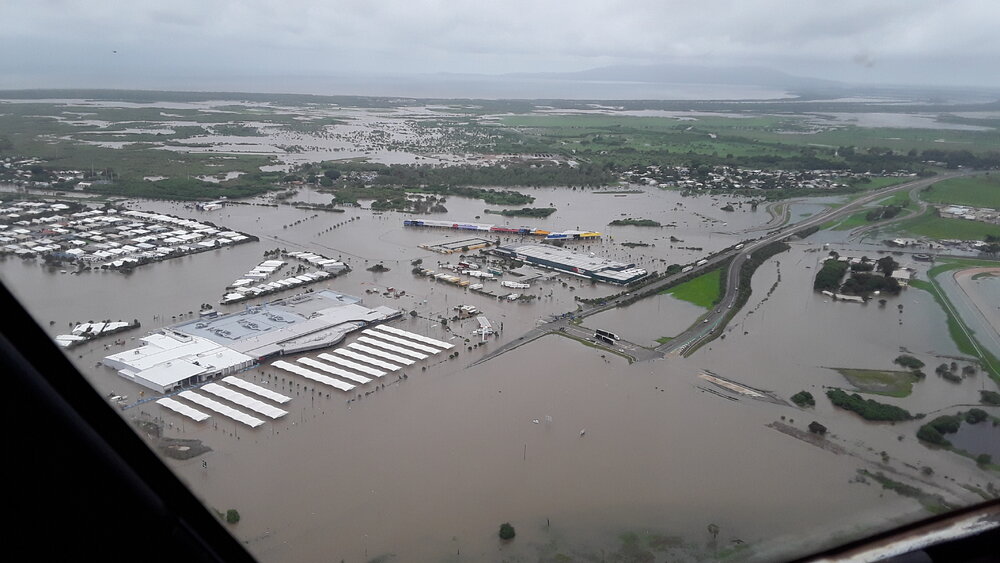 Stuart Drive Intersection, Kmart Fairfield, Townsville Turf Club, aerial photograph during floods, 2019. 