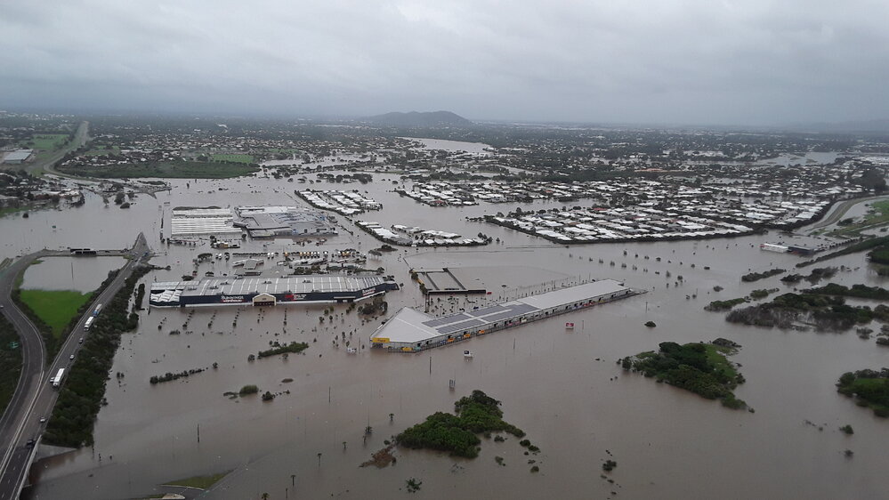 Stuart Drive Intersection, Kmart Fairfield, Townsville Turf Club, aerial photograph during floods, 2019. 