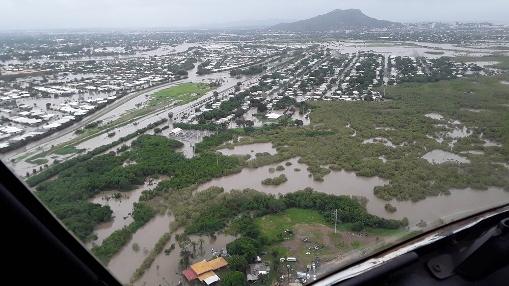Lakeside Drive Idalia, Abbott Street, aerial photograph during floods, 2019. 