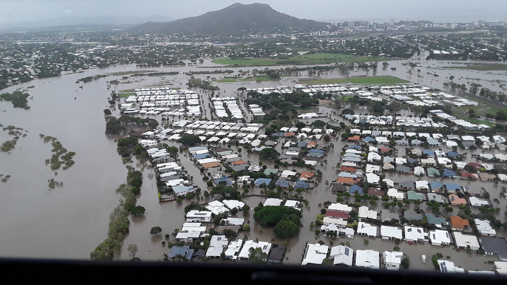 Riveredge Boulevard looking towards Castle Hill, aerial photograph during floods, 2019. 