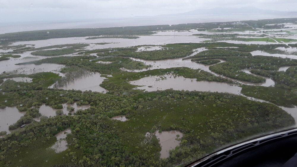 Ross River between Railway Estate and Southern Port Road, aerial photograph during floods, 2019. 