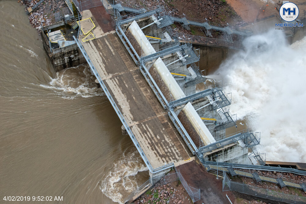 Ross River Dam Spillway, aerial photograph during floods, 2019. 