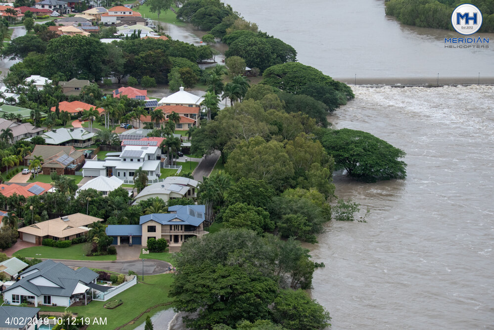 Aplins Weir, Annandale, aerial photograph during floods, 2019