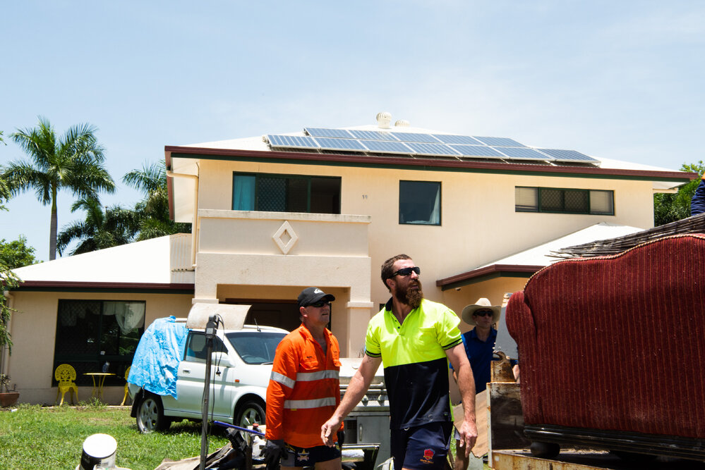 SES and resident volunteers clear away flood damaged home contents, Annandale, 2019.