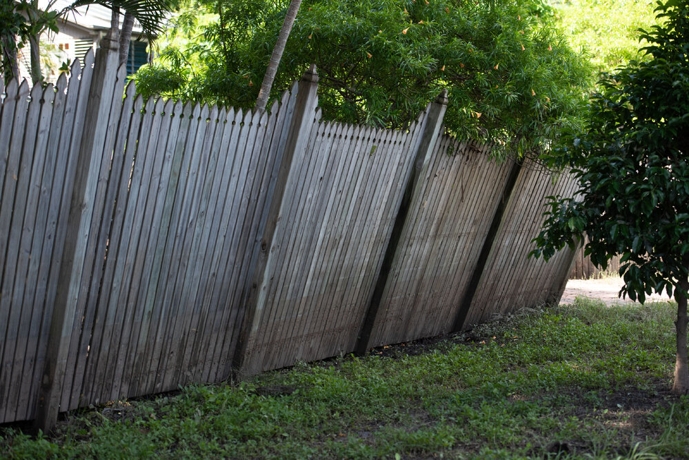 Leaning Fence due to flood waters, Hermit Park, 2019