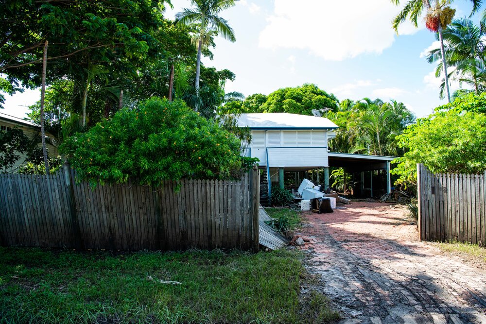 Flood affected property with damaged goods on driveway, Hermit Park, 2019