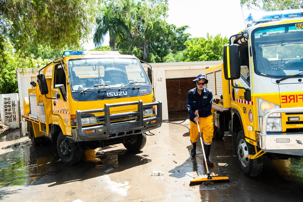 Rural Fire Service Queensland clean up homes after floods, 2019. 