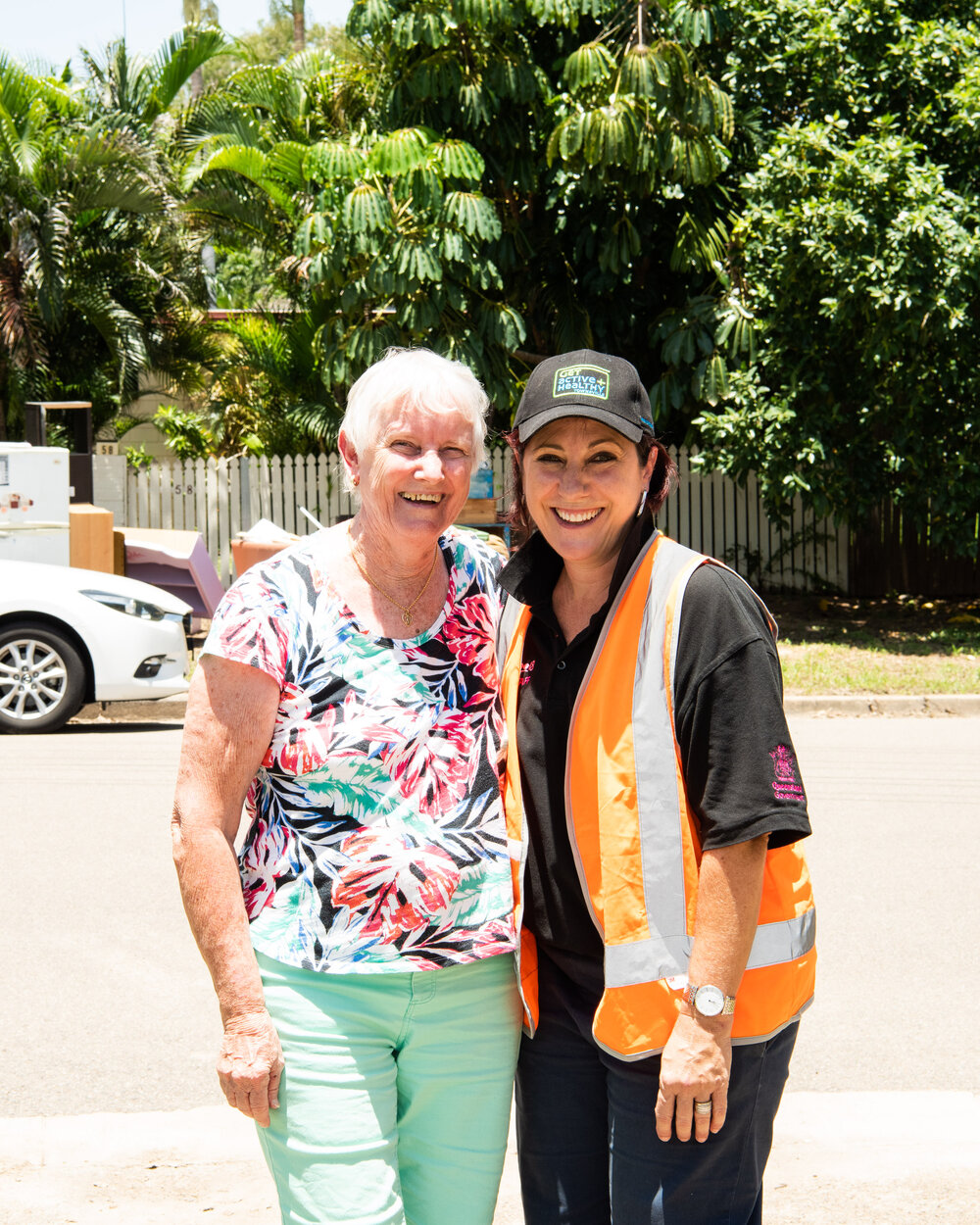 Cr Ann-Maree Greaney and flood-affected resident pose for photograph, 2019.