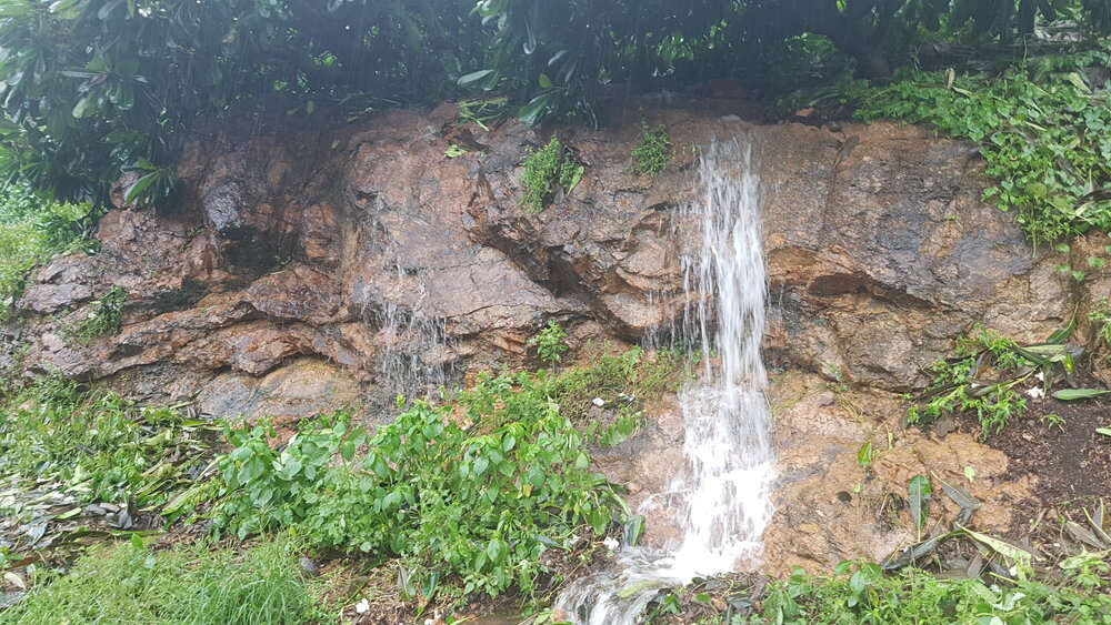Torrential rains stream down storm water system, Yarrawonga, 2019. 
