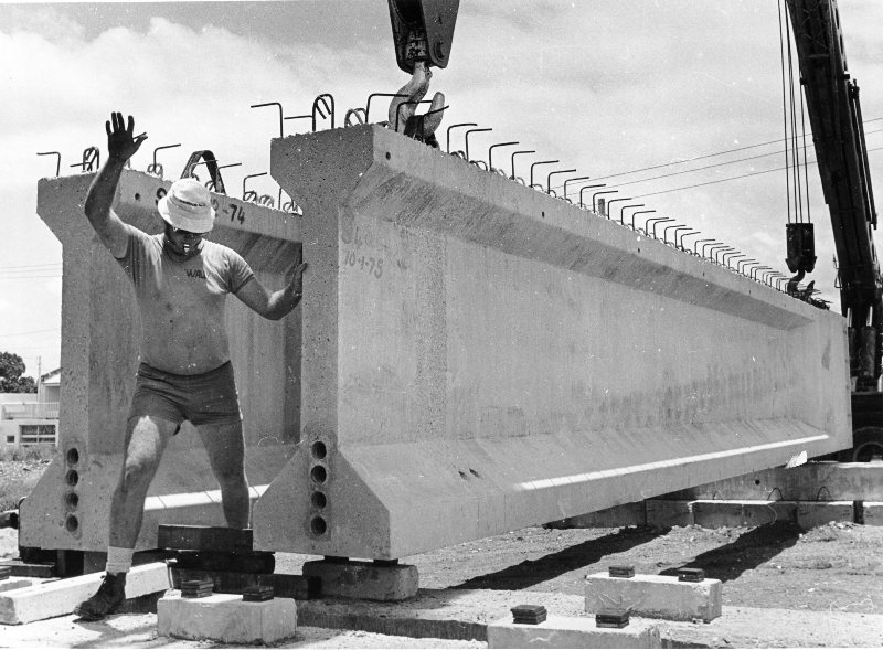 The first beam being placed during construction of the George Roberts bridge across Ross Creek, Townsville. 