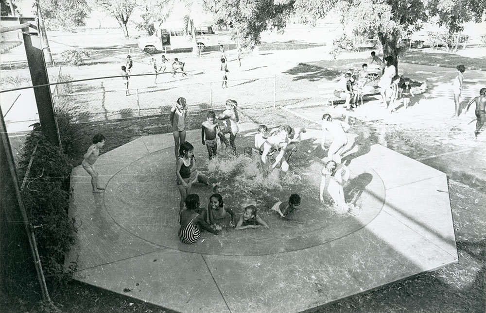 Children in the splash pool of the Bush Children's Home, Rowes Bay, October 1974