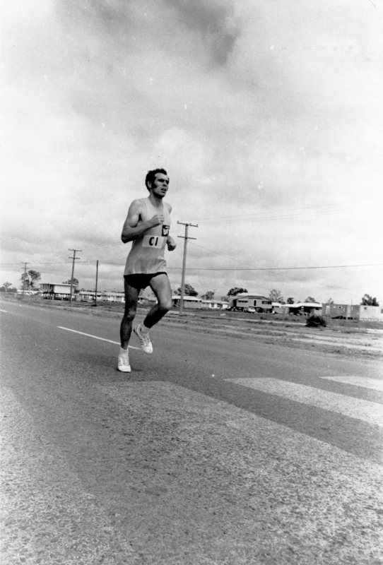 Maurie Creagh, a Mount Isa runner, competes in a Marathon race along Hervey's Range and Ross River Roads, held by the Townsville Marathon Club, Sunday, 23 September 1973. He came second. 
