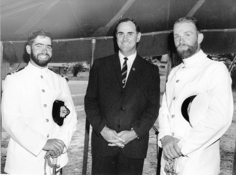 His Worship the Mayor, Alderman Angus J. Smith, O.B.E. speaks with officers from a visiting R.A.N. Frigate, after the official opening of Jezzine Barracks, Townsville, Saturday 31st October, 1964. 