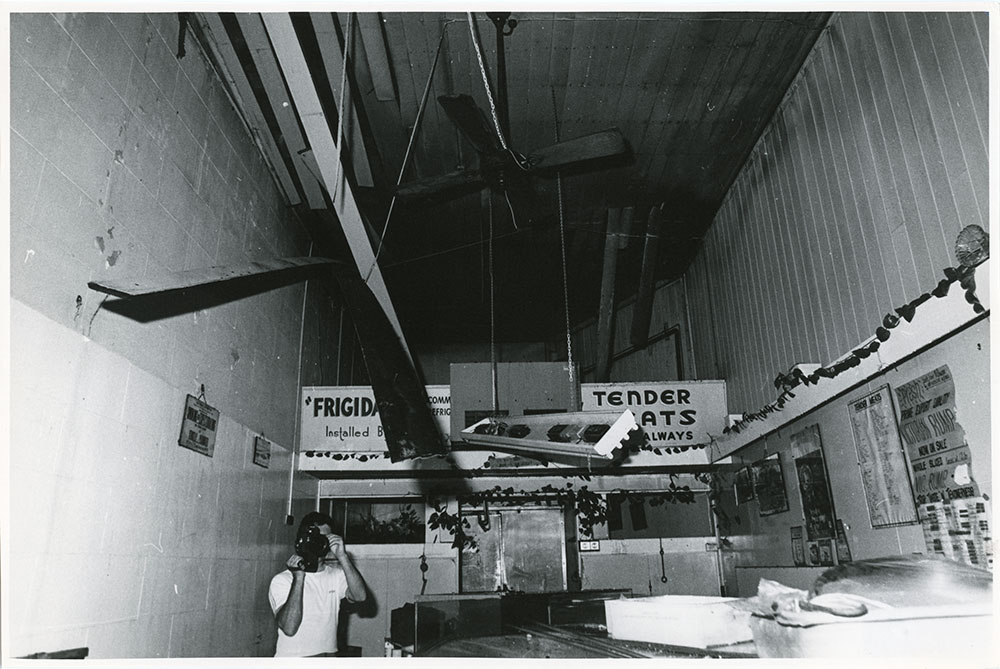 Interior of the Tender Meats butcher shop after the Town Hall fire, Flinders Street, Townsville, 1978. 