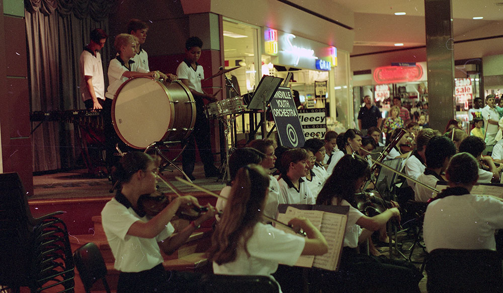Townsville Youth Orchestra performing at Nathan Shopping Plaza, 1991