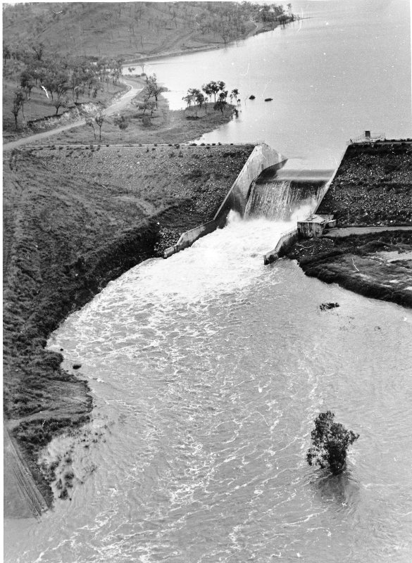 Water flowing over the Ross River Dam spillway. 