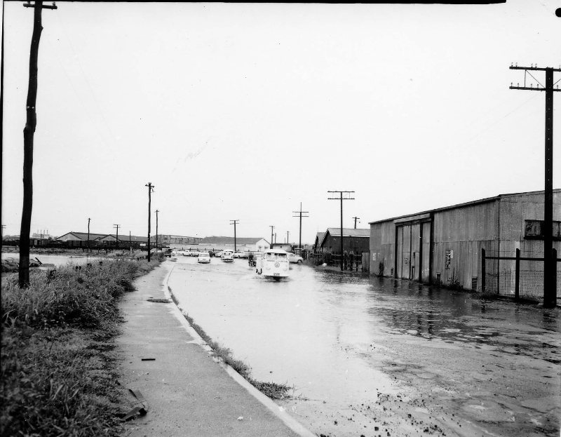 Flooding on Perkins Street West, South Townsville, 1965. 