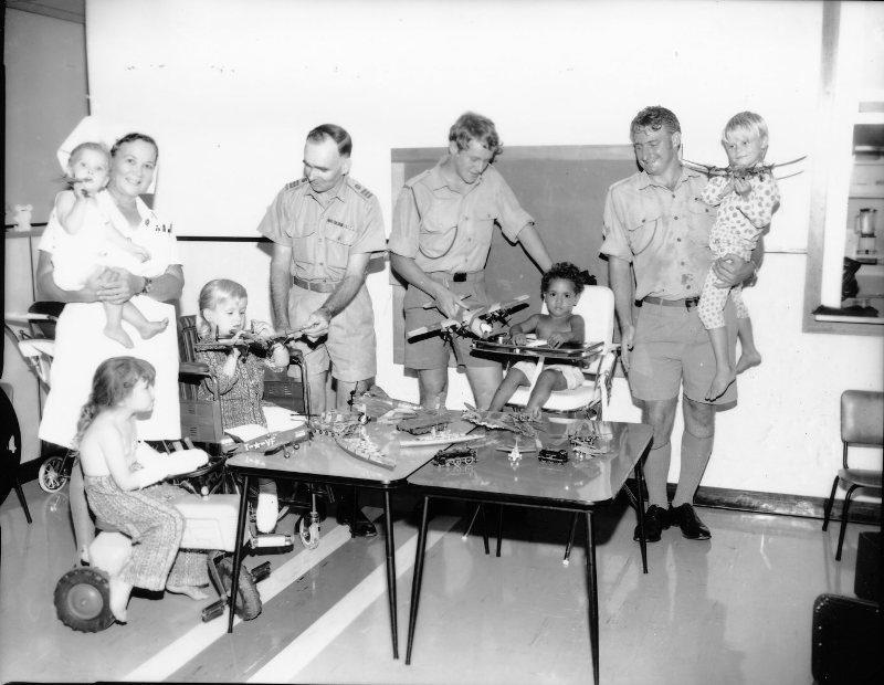 Lavarack Barracks Amateur Hobby Club members present toys to the Townsville General Hospital's childrens ward, 1973 