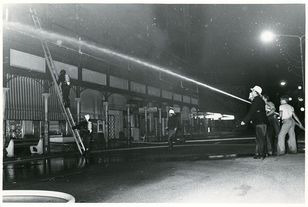 Firemen attending the Town Hall fire, Flinders Street, Townsville, 20 February 1978