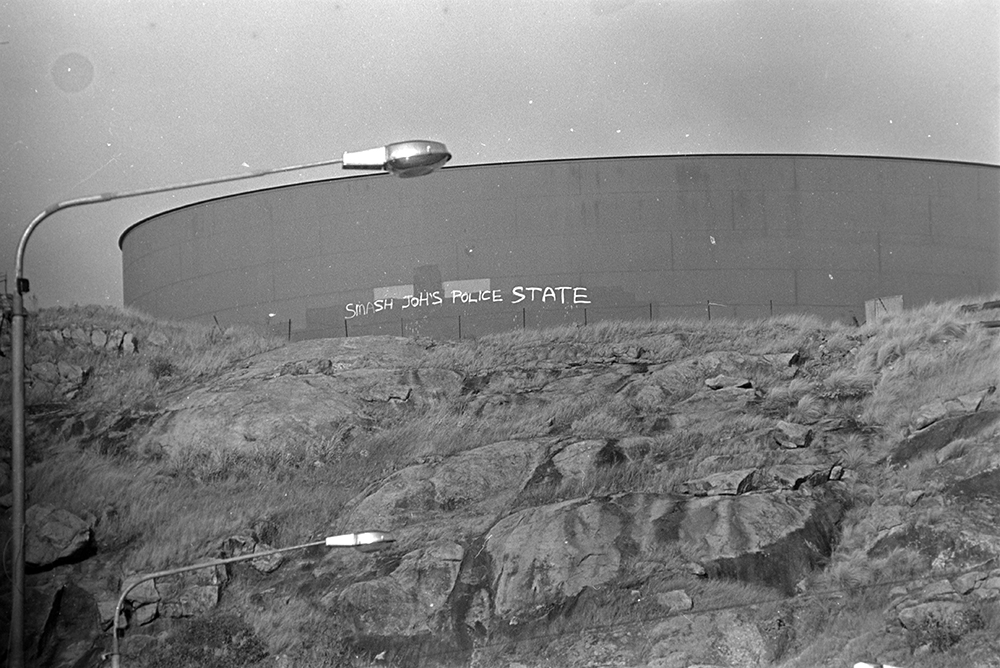 Graffiti on city reservoir, Castle Hill, Townsville, 1979