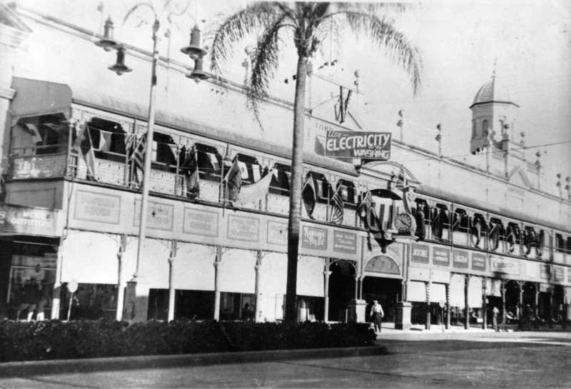The Town Hall decorated for the Victory Parade, Flinders Street, Townsville, 10th June, 1946. 