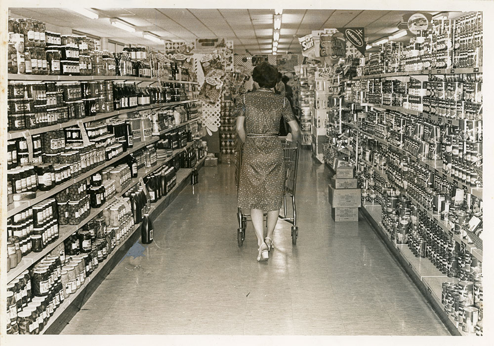 Customer at Philip Leong's Hermit Park store, Townsville, 1950s