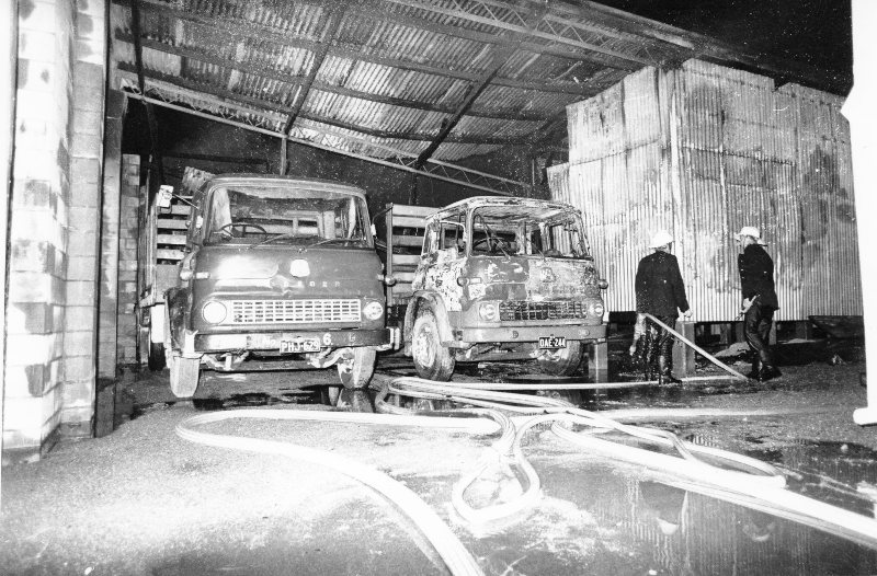 Fire damage to the warehouse and trucks of L.J. West and Sons, South Townsville, Townsville