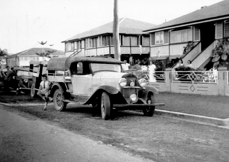 Kenneth McKergow leaning against Whippet after 1946 flood, Railway Estate, 1946 